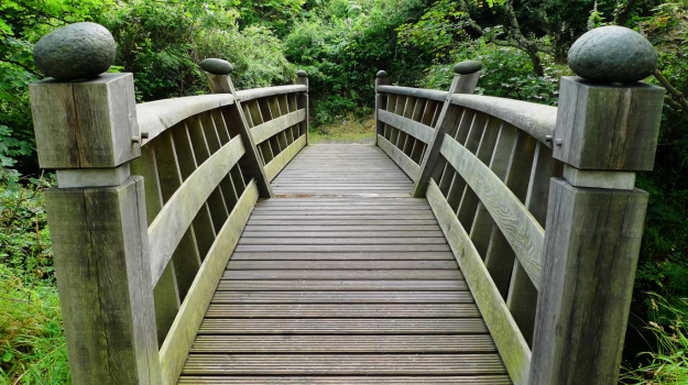 Image of a bridge from one end looking to the other end.